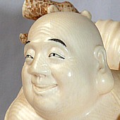 японская статуэтка окимоно из слоновой кости
